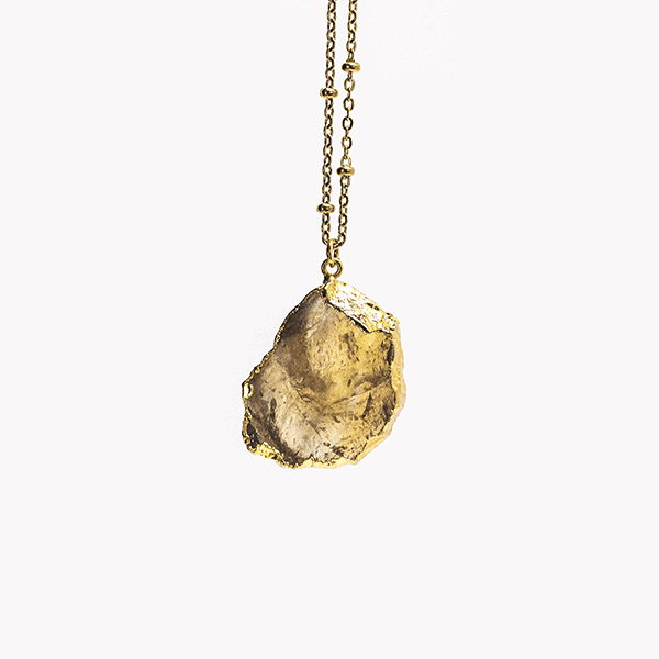 Collier artisanal doré avec une pierre